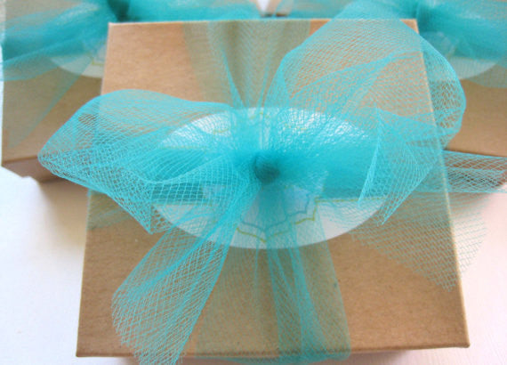 A Sienna Grace Jewelry box with a teal bow